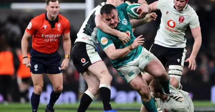 Ireland scrapes past Wales in Dublin to stay in Six Nations title race