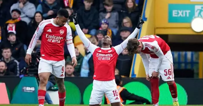 Arsenal advances to FA Cup quarterfinals with 2-1 win over third-tier Mansfield