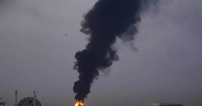 The Latest: UAE briefly closes airspace as Israel strikes Beirut and Tehran