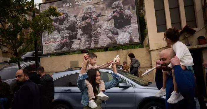 Photos show Lebanon's Catholics marking Palm Sunday as the shadow of war weighs heavily