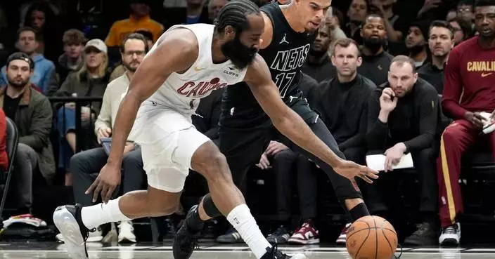 Harden scores 22 points with broken thumb, leads Cavaliers over the Nets 106-102