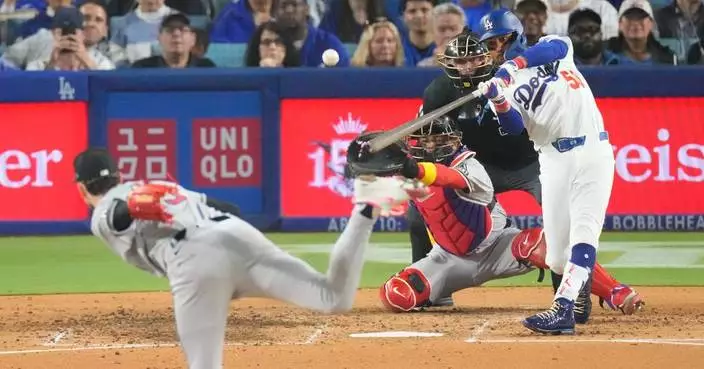 Tucker’s 8th-inning single lifts Dodgers past Diamondbacks 5-4 on World Series ring night