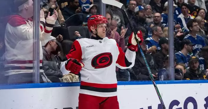 Nikolaj Ehlers' hat trick leads Hurricanes past Canucks 6-4