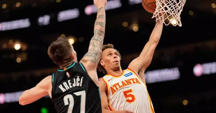 Hawks score 44 points in the 1st quarter and rout the Trail Blazers 135-101