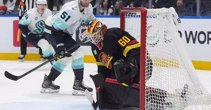 Bobby McMann has 2 goals and an assist in his visa-delayed Kraken debut against Canucks