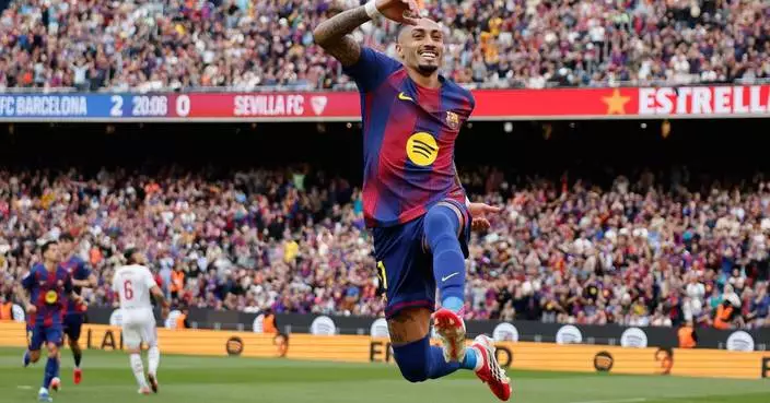 Hat trick for Raphinha as Barcelona beats Sevilla 5-2 to stay 4 points clear of Madrid