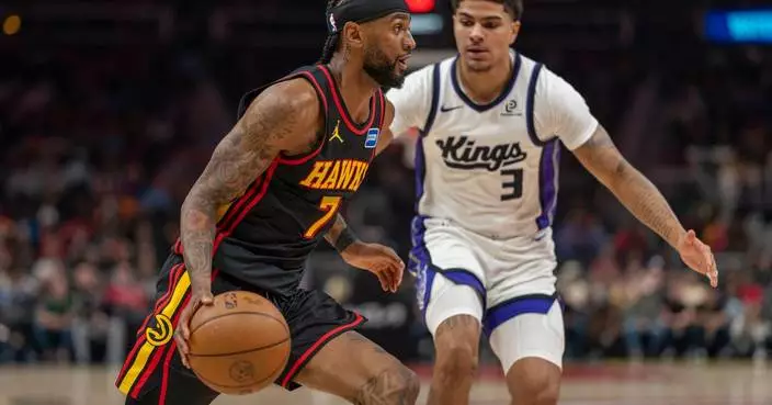 Hawks withstand fourth-quarter surge by Kings in 123-113 victory as Snyder gets 500th win