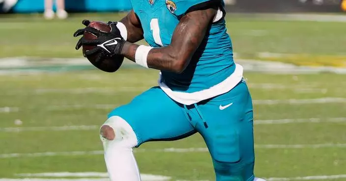 Running back Travis Etienne and guard David Edwards are joining the Saints, AP sources say