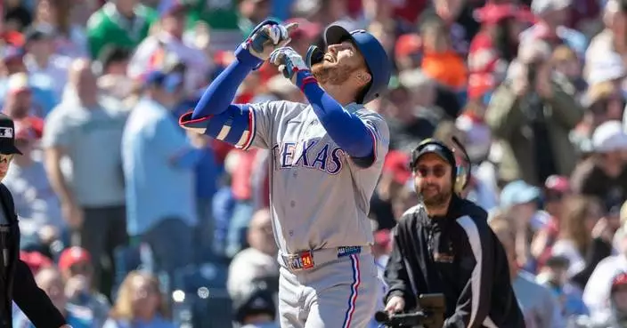 Gore wins 1st start, Nimmo and McCutchen hit 1st homers for Rangers in blowout of Phillies