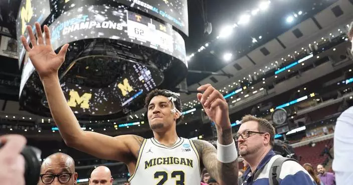 Michigan coach Dusty May leads the Wolverines into the program’s first Final Four since 2018
