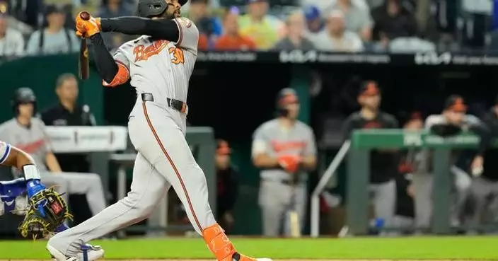 Leody Taveras hits first career grand slam and Orioles hold on for wild 7-5 win over Royals in 12