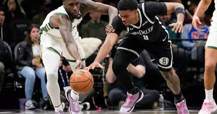 Liddell scores a career-high 21 points to lead the Nets over the Bucks 96-90