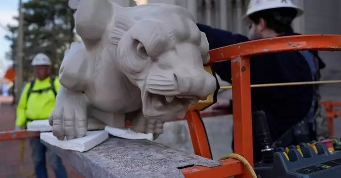Final gargoyle returned to its perch atop rehabbed Kentucky cathedral modeled after Notre Dame