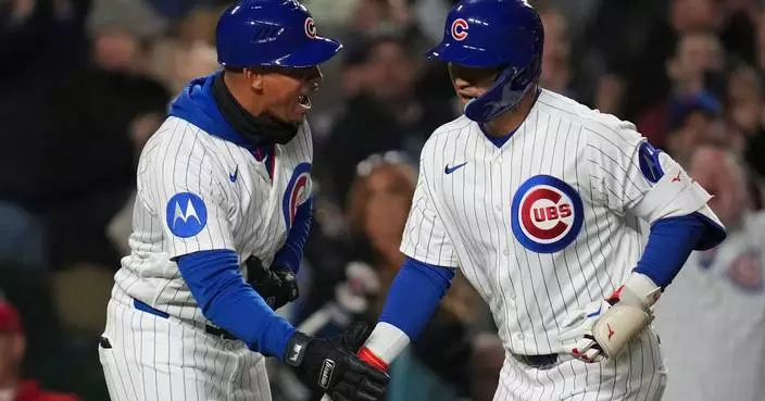 Busch and Suzuki homer as the Cubs beat the sliding Phillies 7-2 for their 8th straight win