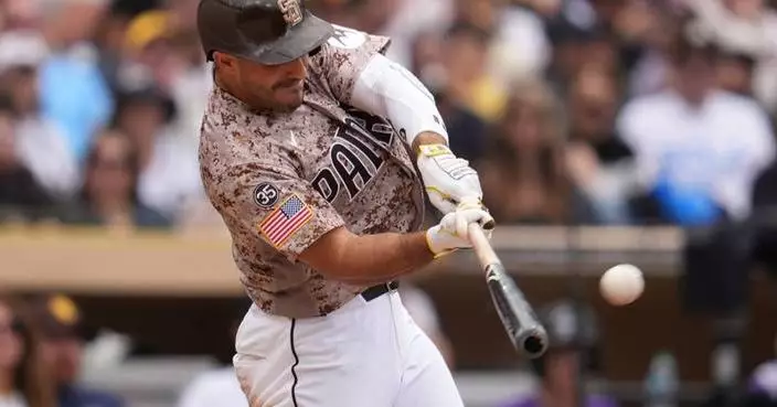 Padres top Rockies 7-2 for 4-game sweep but Nick Pivetta exits with stiff elbow