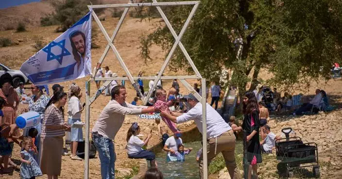 Photos show Israelis celebrating at a West Bank spring despite heightened tensions