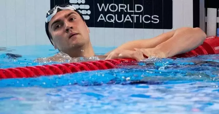 Russian swimmers to be allowed to compete with flag and anthem after restrictions dropped