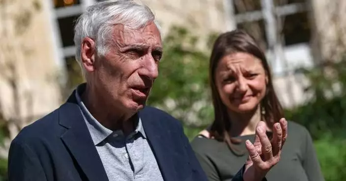 French former detainees Cécile Kohler and Jacques Paris return home after more than 3 years in Iran