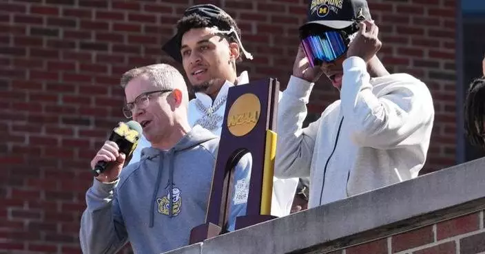 Back in Ann Arbor, Dusty May tells Michigan fans: ‘This trophy is yours’