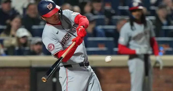 Brady House hits a grand slam and the Nationals blow out the staggering Mets 14-2 in the rain