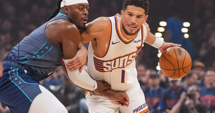 Suns’ Booker hurts ankle after tripping over Dort’s foot, says he doesn’t know if it was on purpose
