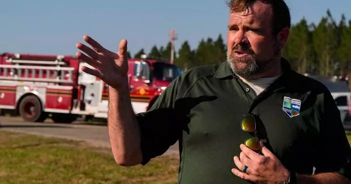 Southern US wildfires force residents to flee, leaving them unsure if their homes are standing