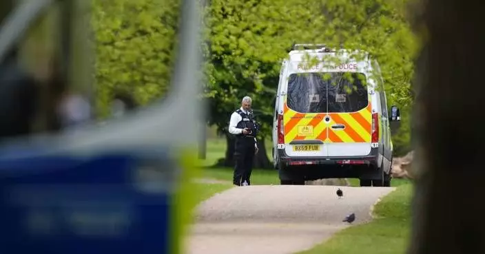 London police, some in protective clothing, probe discarded items near Israeli Embassy