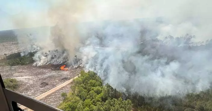 Heavy weekend rain slows 2 sprawling Georgia wildfires, even as new blazes start