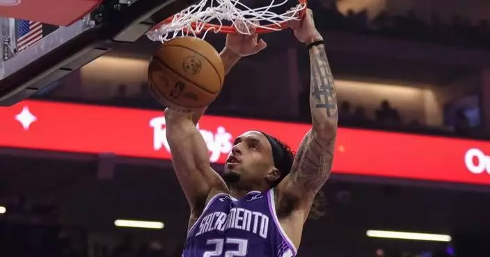 Devin Carter scores 29 points to lead the Kings to a 124-118 win over the Warriors