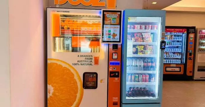 French teen charged in Singapore over a vending machine straw-licking video