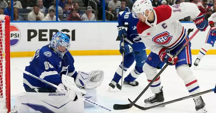 Moser scores in OT as Lightning beat Canadiens 3-2 in Game 2 and tie first-round series