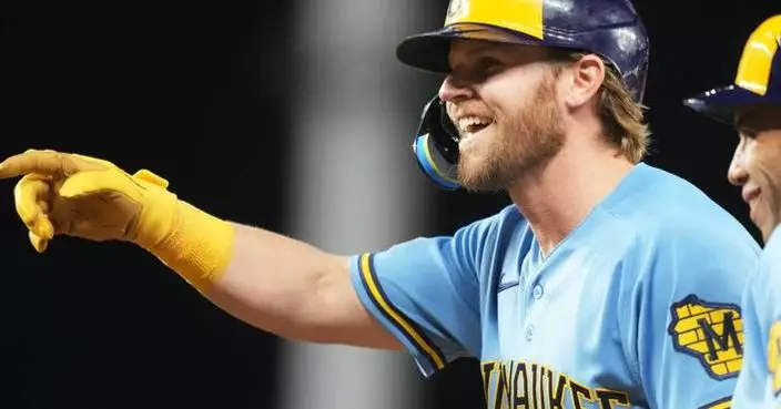 Milwaukee’s Mitchell doubles in the 10th in 7-5 win over Miami