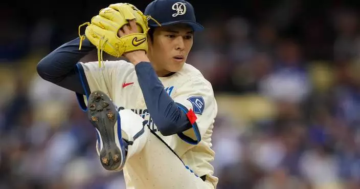 Dodgers score 6 runs in 4th to snap the Cubs’ 10-game winning streak with 12-4 victory