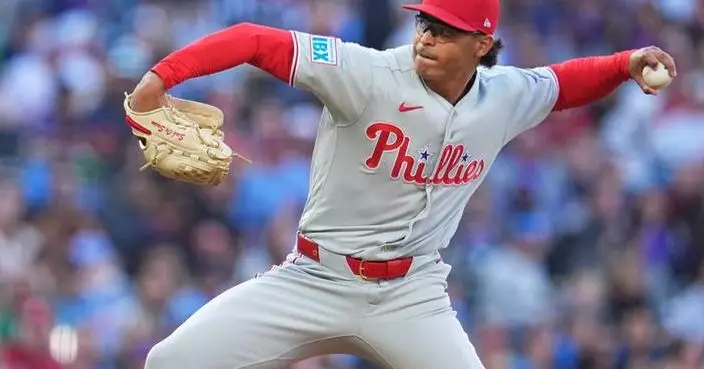 Luzardo fans 11, Turner hits go-ahead RBI double as Phillies edge Rockies 2-1