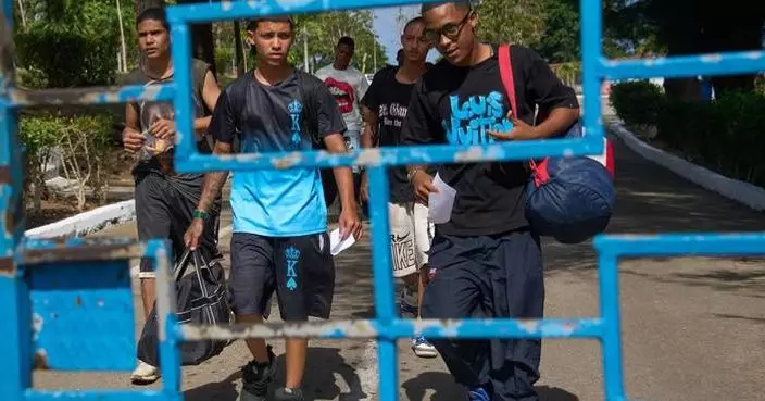 Photos of freed prisoners reuniting with families outside a Cuban prison