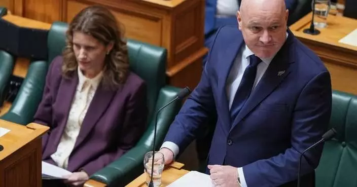 New Zealand Prime Minister Luxon survives party leadership vote months before election