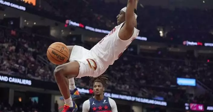 Tomlin scores career-high 26 as Cavaliers defeat Wizards 130-117 in regular-season finale