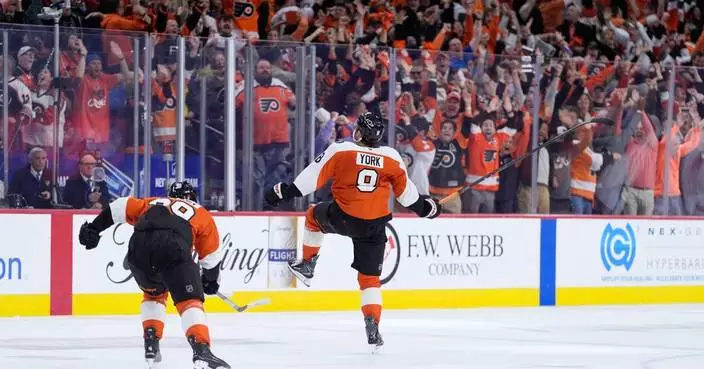 Cam do! Flyers are sky high after York scores OT winner, launches stick into stands and beat Pens