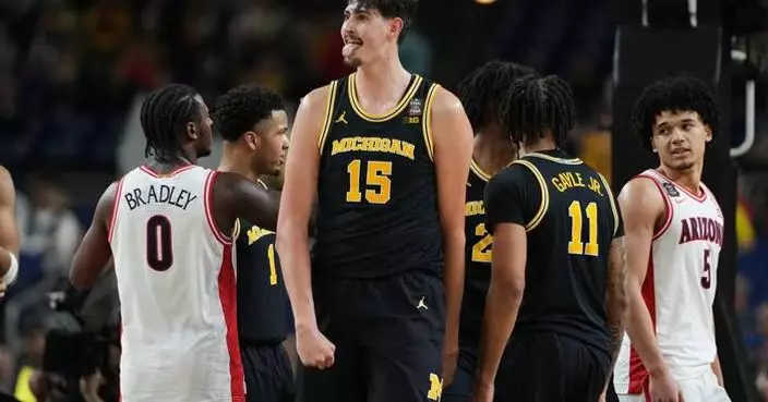 In NCAA title game, a Michigan team on a roll tries to derail a UConn dynasty