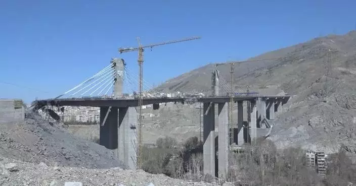 Death toll rises to 13 from US-Israeli attacks on north Iran’s bridge