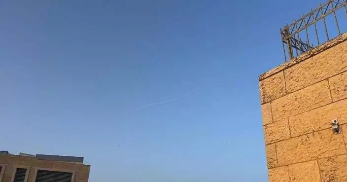 Interceptor missiles rise over Jerusalem as Iran continues missile attacks