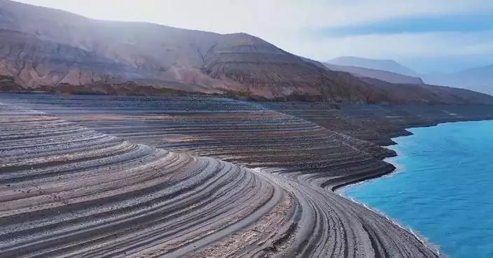 Spectacular “Saturn’s rings” emerge on iconic lake bed in Xinjiang
