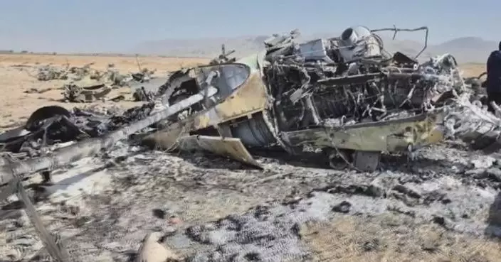 Footage shows wreckage of US warplanes left behind in southern Isfahan after rescue mission