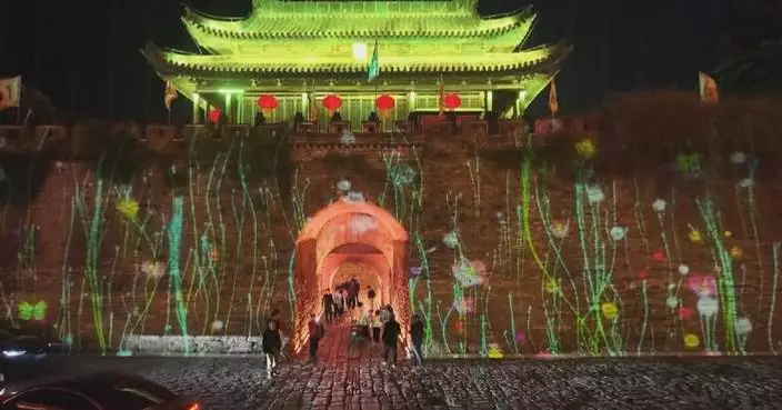 Tech-enhanced ancient county boosts tourism during Qingming holiday