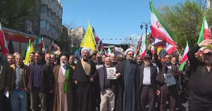 Iranians hold rally in memory of slain supreme leader