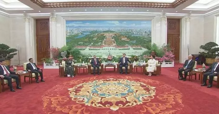 Xi bids farewell to Lam