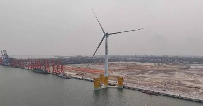 Giant floating wind turbine en route to installation site