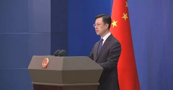 China calls for high vigilance on Japan's remilitarization