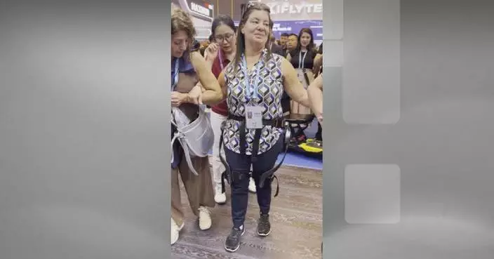 Chinese exoskeleton robot helps overseas visitor walk again at Canton Fair