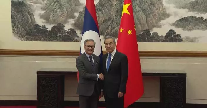 Chinese foreign minister meets Lao counterpart